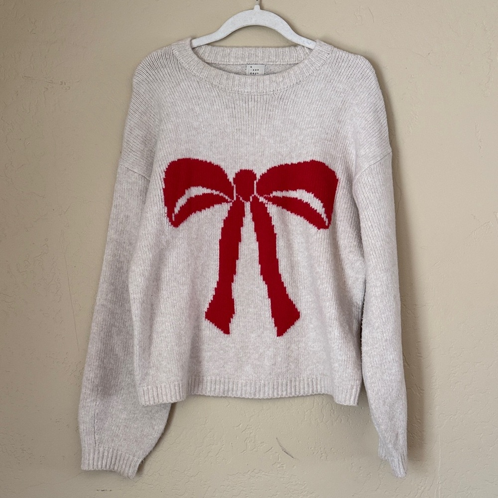 a new day Cream Sweater with Red Bow